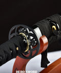 Close-up of Handcrafted Practice Katana With Full Tang Blunt Blade For Dojo Training showcasing tsuba and handle wrap detail.