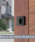 Interior view of Front Door Deadbolt With SmartKey Rekey Technology And Microban Protection In Matte Black, showing thumb turn.