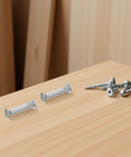 Rock Solid 100 Piece Pack M6 Cabinet Panel Binding Bolts for Furniture Assembly Made From Cold Rolled Steel with silver splint nuts on wood