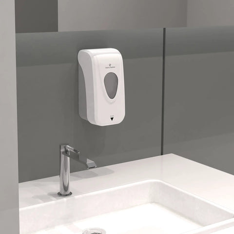 No Sweat Wall Mounted Manual Soap And Hand Sanitizer Dispenser 1000 Ml White mounted above a sink in a modern bathroom.