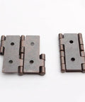 Heavy Duty Double Acting Folding Screen Hinges For Furniture Built Tough With Antique Red Enamel Rock Solid Steel Hardware Snug Wood Panel Mounting Kit Pack Of Eight close-up of two double acting steel hinges