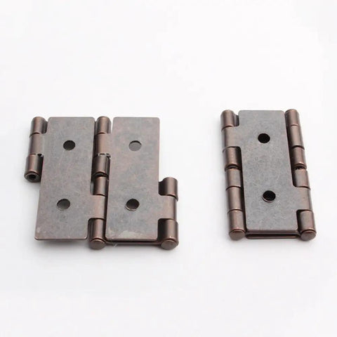 Heavy Duty Double Acting Folding Screen Hinges For Furniture Built Tough With Antique Red Enamel Rock Solid Steel Hardware Snug Wood Panel Mounting Kit Pack Of Eight close-up of two double acting steel hinges