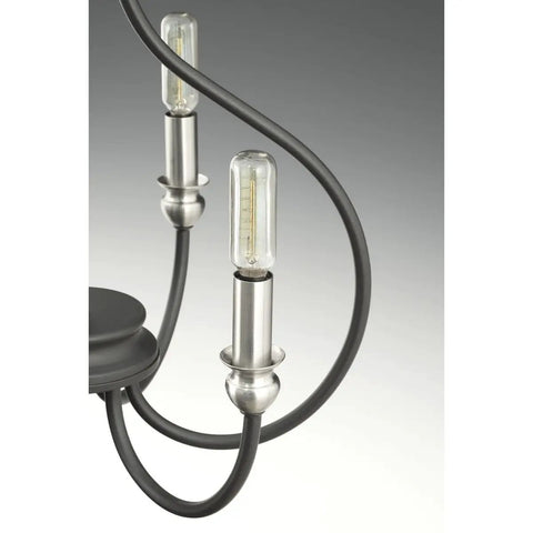 Detail of bulb holders on Whisp Collection 4 Light Farmhouse Chandelier In Graphite Black Finish With Candled Scroll Frame