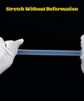 1/4 in ID silicone tubing, translucent blue, stretched between gloved hands.