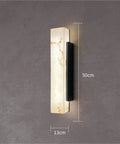 Modern Linear Wall Sconce Imitated Marble LED Wall Light,Warmth on a gray wall, measuring 50cm by 13cm with illuminated marble texture.