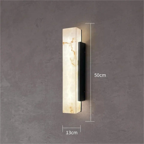 Modern Linear Wall Sconce Imitated Marble LED Wall Light,Warmth on a gray wall, measuring 50cm by 13cm with illuminated marble texture.