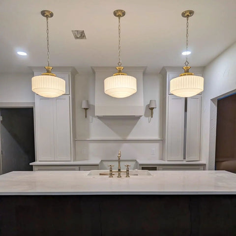 Vintage Brass Pendant Lamp With White Pleated Milk Glass Ceiling Fixture For Kitchen Island Hallway Bedroom Decor Antique Drum Chandelier above a kitchen island.