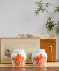 Top Shelf Slick Ceramic Tea Canister Set Featuring Sealed Lids For Loose Leaf Tea Coffee Beans Spices And Easy Pantry Organization Stylish Multi Jar Vessel For Home Use, displayed on a wooden surface with decorative items.