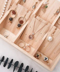 Chill Solid Wood Jewelry Tray Keeps Your Bling Totally Snag Free With A Dang Cool Pendant Grid Built In For Hanging Necklaces Organizing Earrings Or Storing Loose Beads, displaying assorted jewelry.