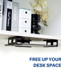 Prime Desk Real Estate Saver This Under Desk Laptop Mount Is Crafted From Solid Steel to hold a laptop under a shelf with books.