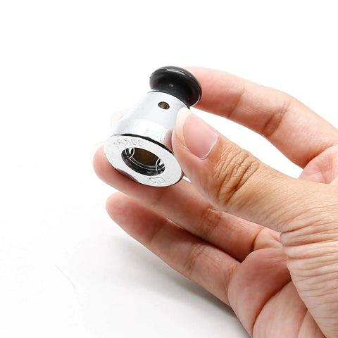 Universal Pressure Cooker Relief Jigger Valve Set in hand, stainless steel, 0.4 inch hole, part of 2-piece kit for home cooks.