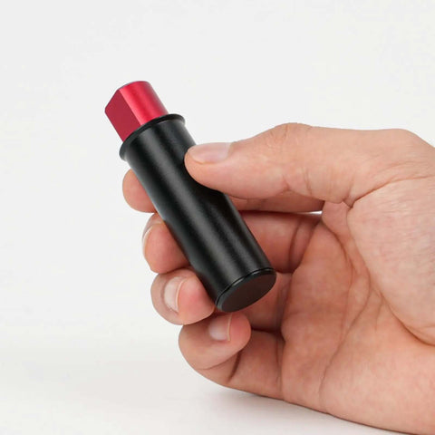 Retractable Table Stop For Woodworking, Matte Black Bench Stop with Compact Design shown in hand