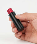 Close-up of hand holding Retractable Table Stop for Woodworking Benches, Rock Solid Bench Dog That Fits Standard Holes, 20mm Diameter