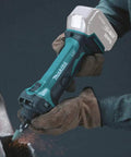 Heavy Duty 18V Cordless Die Grinder delivering gutsy 26000 RPM held in gloved hand with sparks flying.