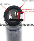 Two Pack 63V 6800uF Aluminum Electrolytic Capacitors Radial Lead For Audio Power Supply High Ripple Current Low ESR 25x50mm Durable Upgrade For Repair And DIY Projects top view
