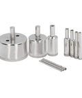 Top Tier Hole Saw Kit That Crushes Glass Tile And Ceramic With Ease Featuring Ten Pieces Ranging From 3mm To 50mm For Smooth Drilling And Home Repair Projects Without The Hassle. Set of silver diamond hole saw bits and drill guides for glass and ceramic drilling