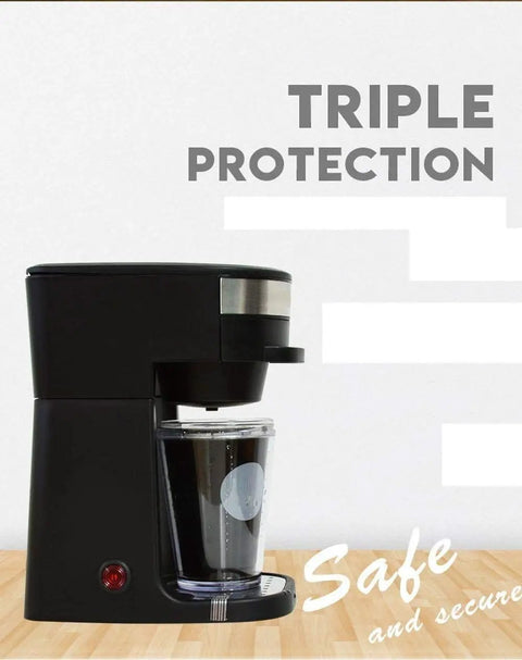 Slick Portable Bean To Cup Coffee Maker Blends Espresso Drinks With A Smooth Soft Touch Panel And Reusable Filter on a wooden surface.