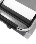 Close-up of the Heavy Duty Electric Panini Press Grill With 1800W Dual Heating Plates, showing stainless steel construction and non-stick surface.