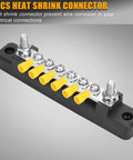 Badass 150A Negative Bus Bar Power Distribution Block For 12V Marine And Automotive Grounding Kits with yellow heat shrink terminals.