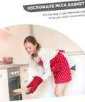 Person using 10 Pack Microwave Mica Plate Sheets For Oil Splash Prevention And Heat Insulation In Microwave Ovens durable guard