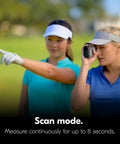 Golfer using a Lightweight Golf Rangefinder With 6x20 Optics, 800-Yard Range, rainproof, pocket-size design on the golf course.