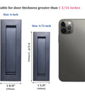 Comparison of 5.91 inch and 4.72 inch Matte Black Flush Sliding Closet Door Handles Set Of 2 next to smartphone for size reference.