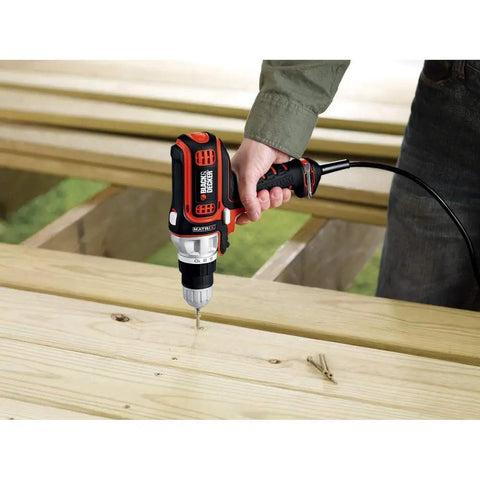 Matrix Quick Connect System Drill Driver With Tool Free Attachments in use on wooden boards for DIY projects