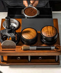 Heavy Hitter Double Tier Solid Wood Espresso Tamping Station With Combo Knock Box Premium Handcrafted Coffee Bar Organizer Kit displayed on counter.