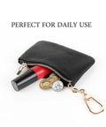 Full Grain Leather Coin Purse And Keychain Wallet With Slick Pull Zipper Closure Handy Card Slots Stylish Matte Black Finish No Fuss Go To Everyday Carry with coins and lipstick inside.