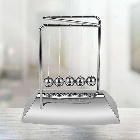 Z Shape Newton's Cradle Pendulum Balls For Learning And Home Office Decoration A Hands On Dynamics Experiment Tool That Makes Science Fun A Desk Toy For Kids And Students To Master Energy Transfer, shown on a modern desk.