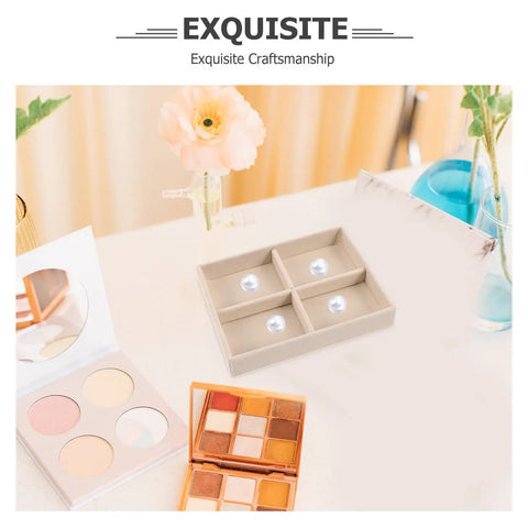 No Sweat Beige Velvet Jewelry Tray With Four Grid Compartments For Quick Sorting Rings Earrings And Bracelets Easy Drawer Insert Organizer Totally Sweet For Home Organization And Travel Cases displayed with makeup palettes and flower.