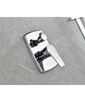 Wall Mounted Waterfall Rain Shower System with 3 Body Sprays & Handheld chrome control valve on gray tile wall.
