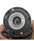 Electromagnetic brake unit front view; round black housing with silver center and splined shaft, cable visible