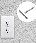Heavy Duty Extra Long Outlet Mounting Screws Forty Piece Pack Six Thirty Two Gauge One And Half Inch Reach White Painted Phillips Countersunk Heads Slick Finish No Sweat Install For Deep Wall Boxes And Backsplash Extenders Rig Gear with visible screws and outlet.