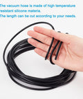 Top Tier 16 Point 4 Feet Black Silicone Vacuum Hose With 2mm Inner Diameter Fits High Temp Automotive Engines And DIY Pipeline Jobs For Smooth Suction And Reliable Performance, coiled in hand
