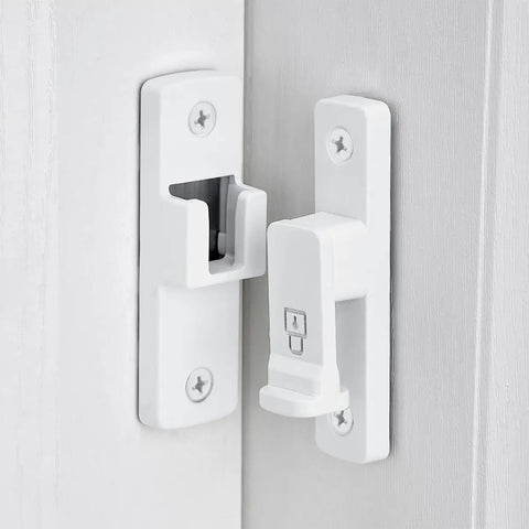 White 90 Degree Barn Door Lock With Right Angle Slide Latch For Sliding Wood Panels mounted on a door with screws.