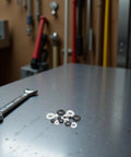 COHEALI 180 Piece Heavy Duty Rubber Grommet Kit Saves Wires From Chafing And Damage, Waterproof Nylon Washers Secure Cables In Cars, Homes, And Marine Gear Without Tools. Rubber grommets and nylon washers on workbench