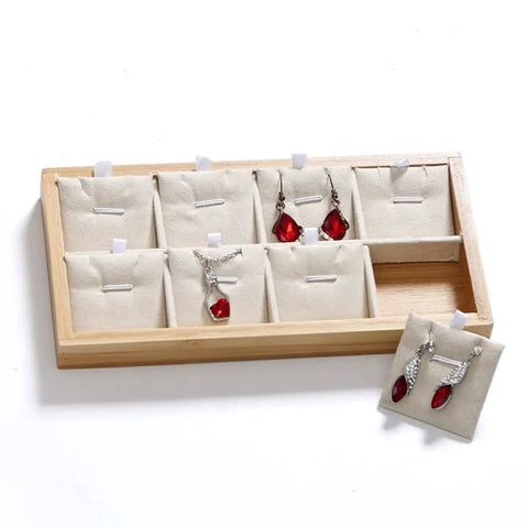 Retro Wooden Jewelry Organizer Tray With Eight Grids To Keep Your Bling Slick And Prevent Tangles While Displaying Necklaces And Earrings On Any Desk Surface with red earrings.