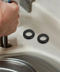Check Out These 6pcs Black Rubber Grommet Kits For Wiring And Cable Management To Keep Your Setup Tidy With Practical Nonslip Cable Hole Covers That Secure Grip And Optimized Throughhole Design For Easy Routing. Black rubber sink grommets on a countertop, shown near a cable hole