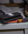 Insulated 8 In 1 Screwdriver Set With Interchangeable Blades For Electrical And General Repairs on shelf with pouch