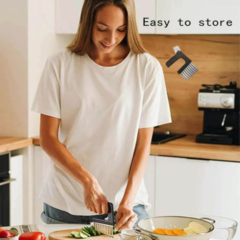 Front view of a woman using a stainless-steel crinkle-cut veggie cutter to slice vegetables on a wooden cutting board.