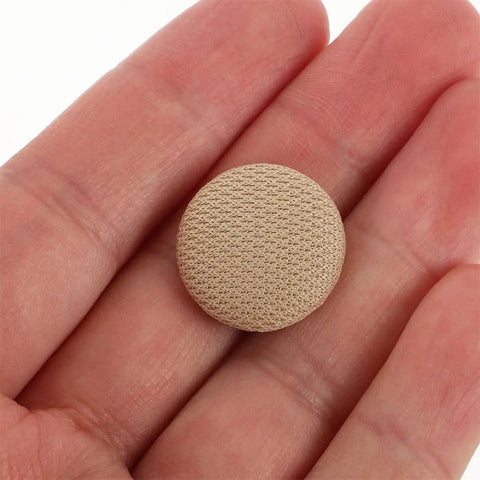 Close-up of a single beige flannel car roof liner fix pin from the 30 Piece Car Headliner Repair Kit With Roof Rivets And Installation Tool.
