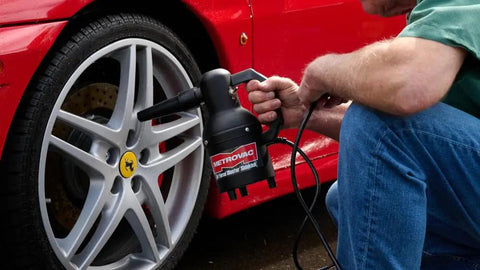 Using handheld car blower for detailing and cleaning, electric duster and dust buster for cars, clothes, surfaces, 120V quick dust removal