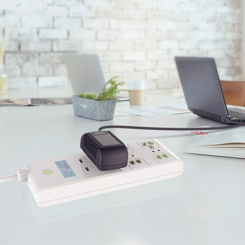Universal AC DC Adapter For SainSonic RST599 IP67 on desk with power strip