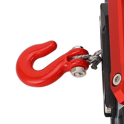 Close-up of red hook on Rock Solid CNC Dual Motor Winch for RC Cars, showing cable attachment for realistic offroad recovery.