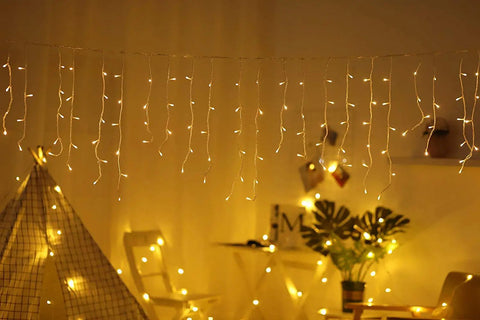 Solar Icicle String Lights 36 Ft 264 LEDs Waterproof Weatherproof Extendable Curtain Lights illuminating indoor decor