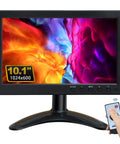 10.1 inch monitor showing colorful display with remote, different from 15.6 Inch IPS FHD Monitor With Remote, Versatile HDMI VGA AV BNC USB Inputs.