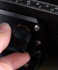 Close-up of finger adjusting the knob on a Precision Woodworking Miter Gage With 360Mm Fence And Flip Stop For Bench Saws.