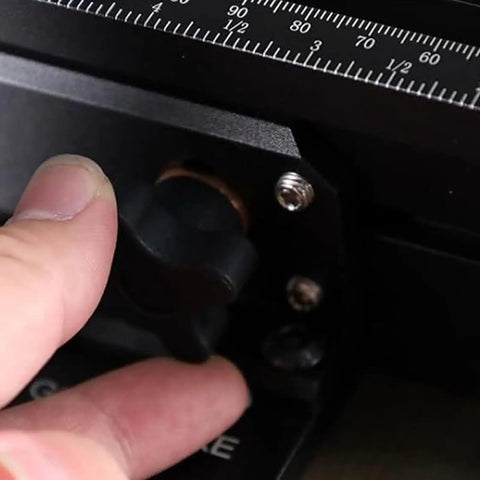 Close-up of finger adjusting the knob on a Precision Woodworking Miter Gage With 360Mm Fence And Flip Stop For Bench Saws.