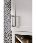 Kara Pull Serene Collection 3-3/4 Inch Center To Center Brushed Satin Nickel Finish on kitchen cabinet door.